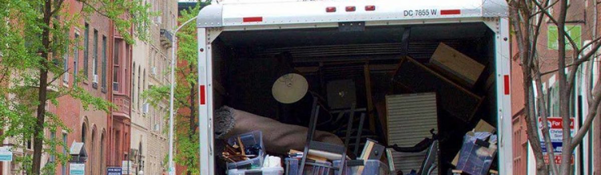 Local Moving Company Making Their Way Through The City